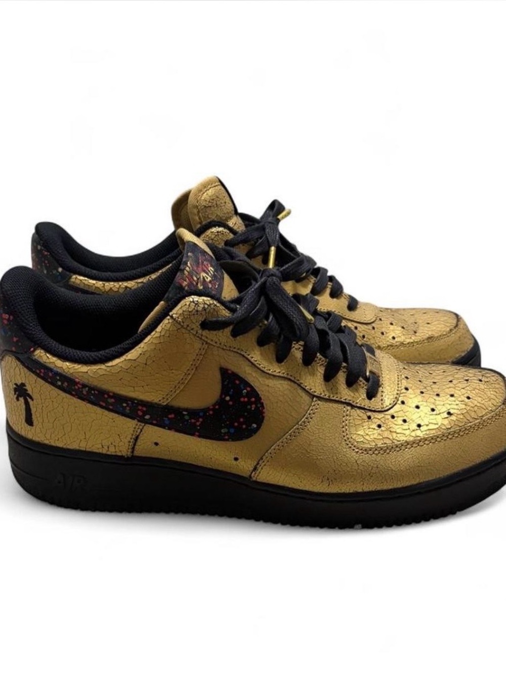 Nike Low-Top Sneakers - Metallic Gold with Black Speckled Swoosh